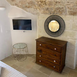Dettaglio camera deluxe del B&B a Ostuni – Atmosfera elegante
